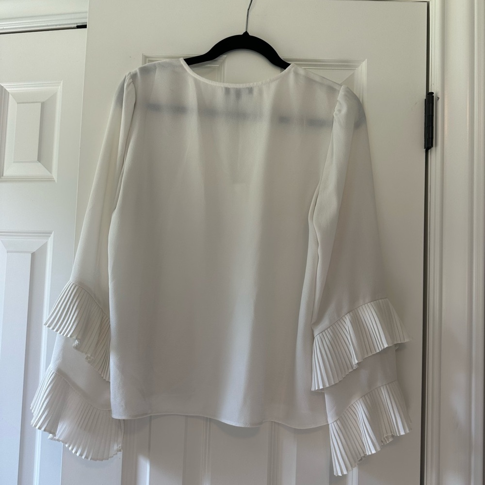1 state white blouse